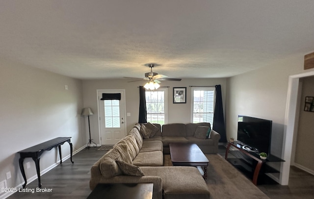 4177 Fairgrounds Rd, Brandenburg, KY 40108 - living area featuring baseboards, a ceiling fan, and dark wood-style flooring