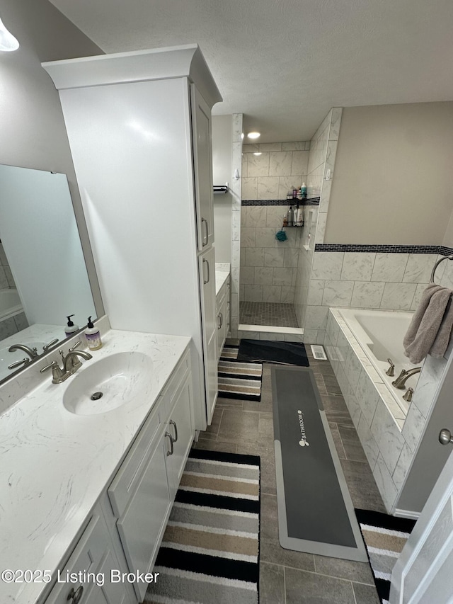 4177 Fairgrounds Rd, Brandenburg, KY 40108 - bathroom with a garden tub, a stall shower, and vanity