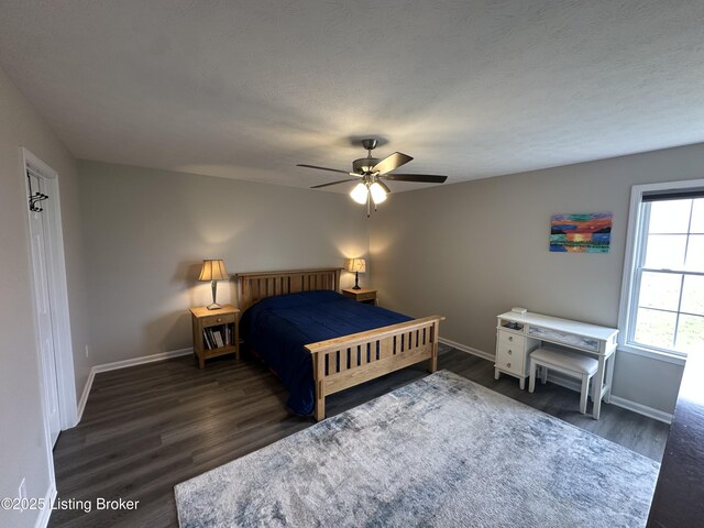 4177 Fairgrounds Rd, Brandenburg, KY 40108 - bedroom featuring baseboards, ceiling fan, and wood finished floors