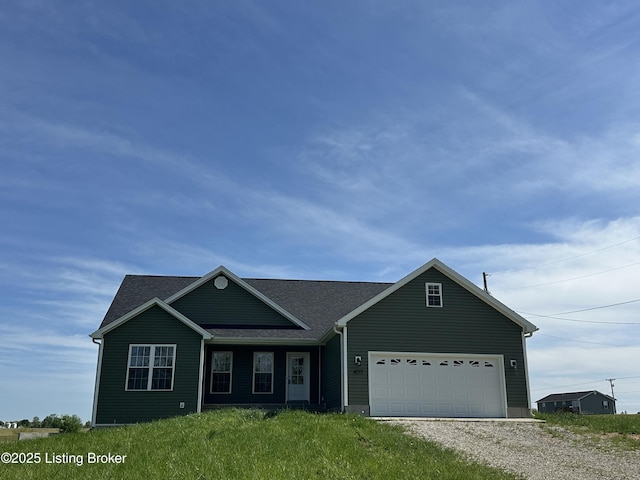 4177 Fairgrounds Rd, Brandenburg, KY 40108 - view of front facade with a garage, a shingled roof, and gravel driveway