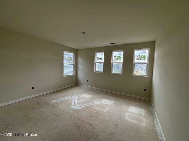 1004 Dry Run Ct, Shelbyville, KY 40065 - unfurnished room featuring a healthy amount of sunlight and baseboards