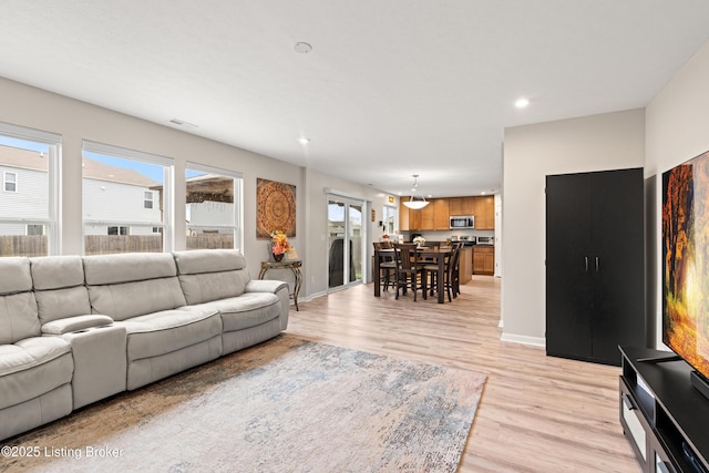 115 Shadow Rock Ct, Shepherdsville, KY 40165 - living area featuring a wealth of natural light, baseboards, light wood-style floors, and recessed lighting