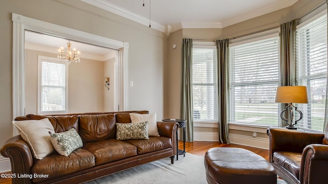 4742 Southern Pkwy, Louisville, KY 40214 - living room with wood finished floors, crown molding, a chandelier, and a wealth of natural light