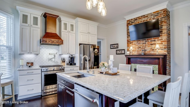 4742 Southern Pkwy, Louisville, KY 40214 - kitchen featuring premium range hood, white cabinets, ornamental molding, and stainless steel appliances