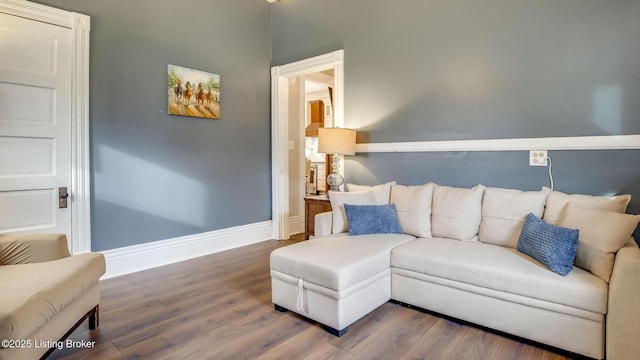 4742 Southern Pkwy, Louisville, KY 40214 - living room with dark wood-style flooring and baseboards
