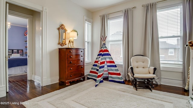 4742 Southern Pkwy, Louisville, KY 40214 - living area featuring dark wood-style floors and baseboards