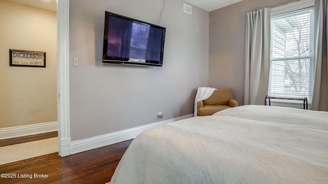 4742 Southern Pkwy, Louisville, KY 40214 - bedroom with dark wood-type flooring, baseboards, and visible vents