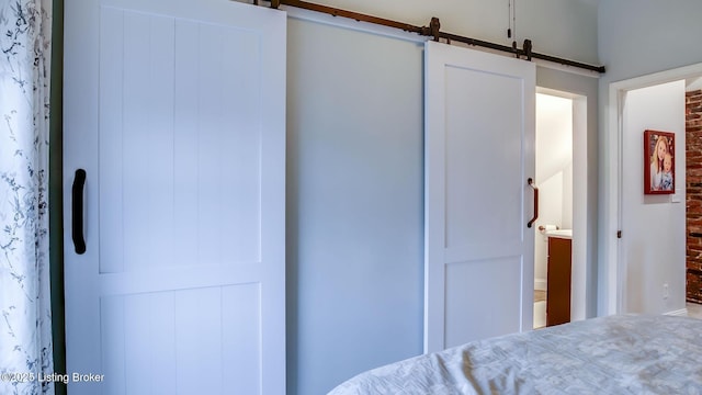 4742 Southern Pkwy, Louisville, KY 40214 - bedroom featuring a barn door