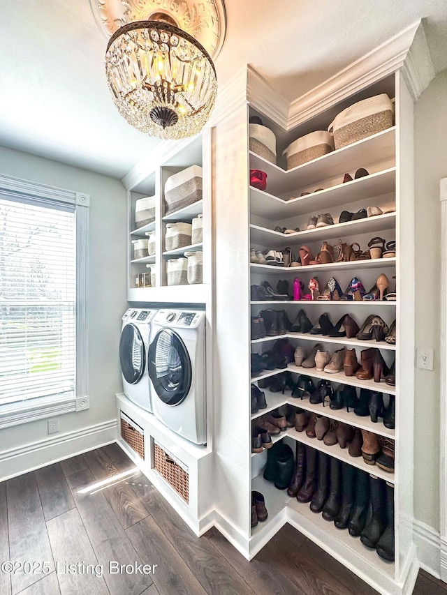 4742 Southern Pkwy, Louisville, KY 40214 - washroom featuring baseboards, laundry area, dark wood finished floors, separate washer and dryer, and a notable chandelier