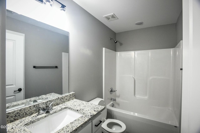 full bathroom with vanity, toilet, tub / shower combination, and visible vents