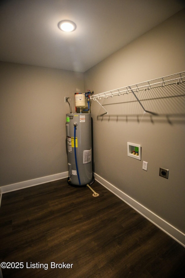 utility room featuring electric water heater