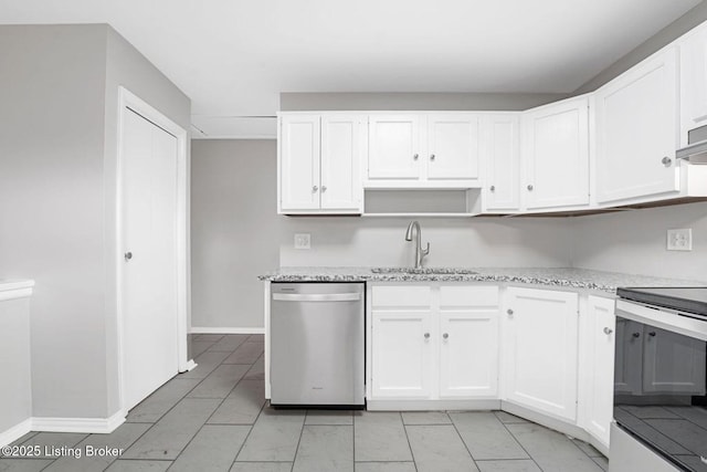 3217 Wellingmoor Ave, Louisville, KY 40218 - kitchen with white cabinets, light stone countertops, appliances with stainless steel finishes, and a sink