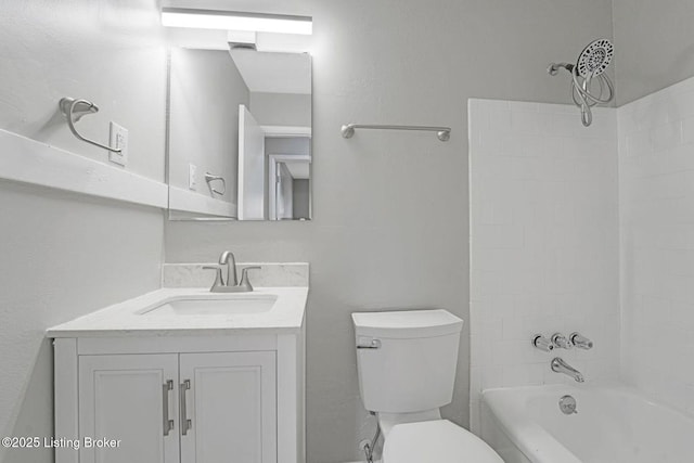 3217 Wellingmoor Ave, Louisville, KY 40218 - bathroom with toilet, vanity, and washtub / shower combination
