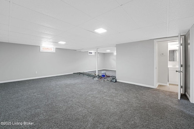 3217 Wellingmoor Ave, Louisville, KY 40218 - below grade area featuring carpet flooring, baseboards, and a drop ceiling