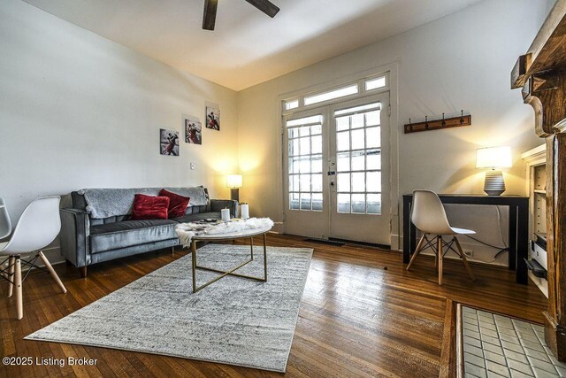 living room with french doors, a ceiling fan, and hardwood / wood-style floors