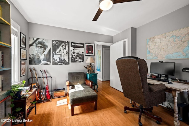 office area featuring wood finished floors and ceiling fan