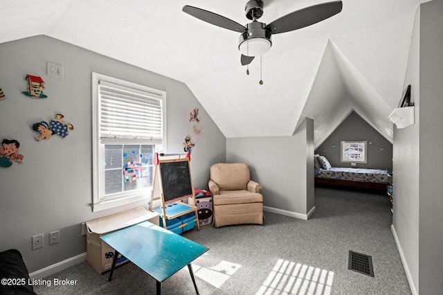 carpeted bedroom featuring baseboards, lofted ceiling, ceiling fan, and visible vents