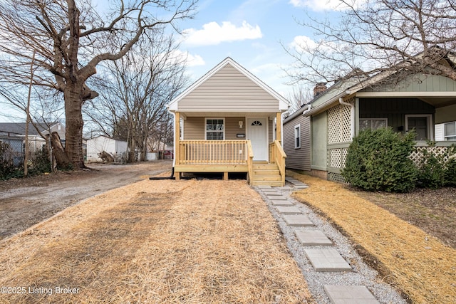2064 Emmet Ave, Louisville, KY 40217 - view of front of home featuring covered porch and a chimney