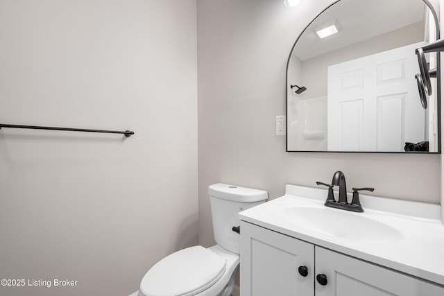 2064 Emmet Ave, Louisville, KY 40217 - bathroom with toilet, vanity, and a shower