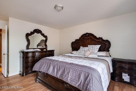 3307 Leith Ln Apt 3, Louisville, KY 40218 - bedroom featuring wood finished floors