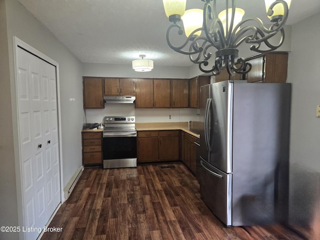 119 Norwood Dr, Elizabethtown, KY 42701 - kitchen featuring appliances with stainless steel finishes, under cabinet range hood, a chandelier, dark wood-style floors, and light countertops