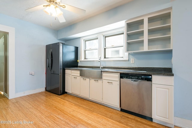 628 Harrison Ave, Louisville, KY 40217 - kitchen with light wood-style flooring, dishwasher, a sink, open shelves, and fridge with ice dispenser