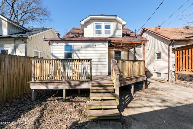 628 Harrison Ave, Louisville, KY 40217 - back of house with a wooden deck and fence
