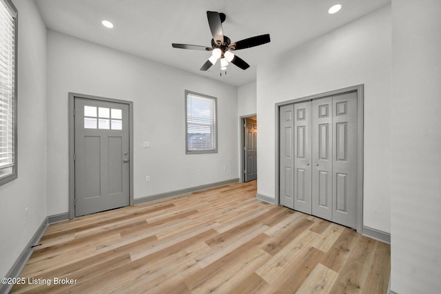 foyer entrance featuring recessed lighting, baseboards, light wood finished floors, and ceiling fan