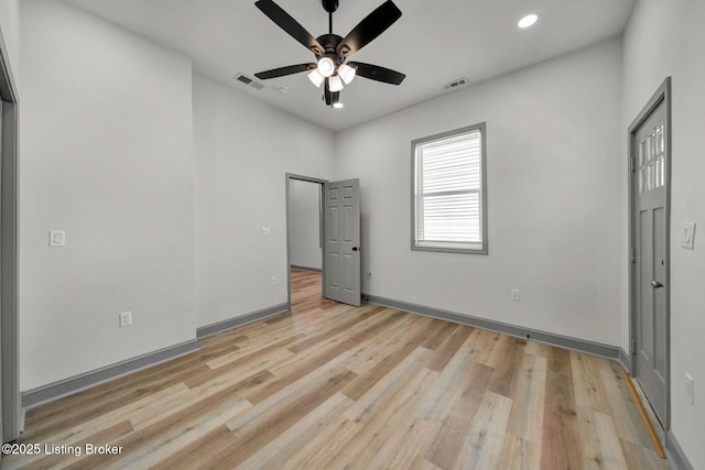 unfurnished bedroom with recessed lighting, baseboards, light wood finished floors, and visible vents