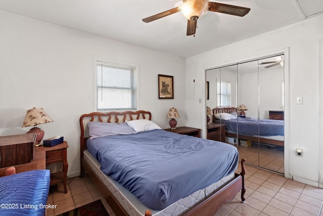 1147 Poplar Grove Rd, Buffalo, KY 42716 - bedroom with a closet, light tile patterned flooring, and a ceiling fan