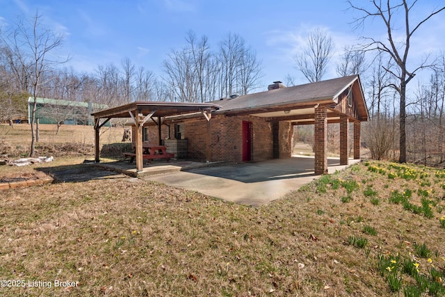 1147 Poplar Grove Rd, Buffalo, KY 42716 - view of patio featuring a carport