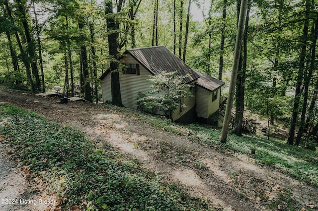 110 Nathan Rd, Falls Of Rough, KY 40119 - view of property exterior with driveway and a forest view