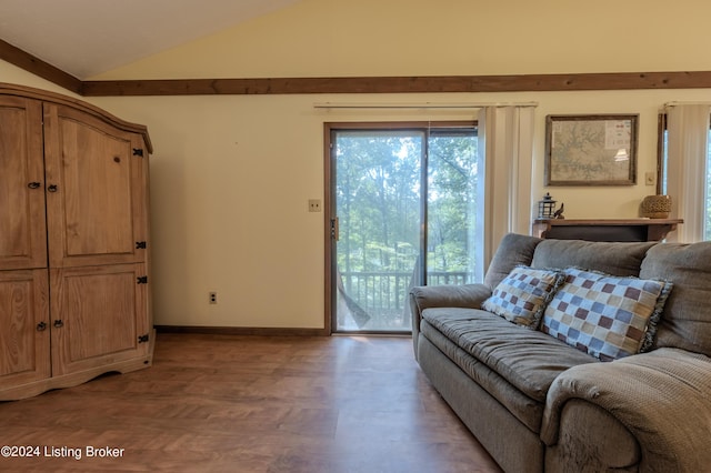 110 Nathan Rd, Falls Of Rough, KY 40119 - living room with baseboards, lofted ceiling, and light wood-style flooring
