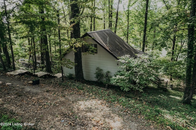 110 Nathan Rd, Falls Of Rough, KY 40119 - view of side of home with metal roof and a view of trees