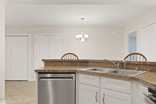 135C Michelle Dr, Shepherdsville, KY 40165 - kitchen with an inviting chandelier, a sink, dishwasher, white cabinetry, and decorative light fixtures