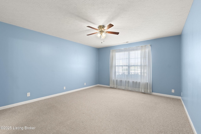 135C Michelle Dr, Shepherdsville, KY 40165 - carpeted spare room with a ceiling fan, baseboards, and a textured ceiling
