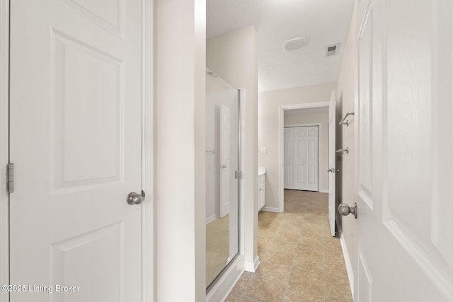 135C Michelle Dr, Shepherdsville, KY 40165 - hallway with light tile patterned floors, baseboards, and visible vents