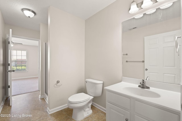 135C Michelle Dr, Shepherdsville, KY 40165 - full bathroom with baseboards, visible vents, toilet, and vanity
