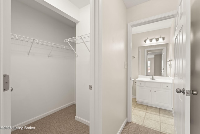 135C Michelle Dr, Shepherdsville, KY 40165 - walk in closet with light carpet and a sink