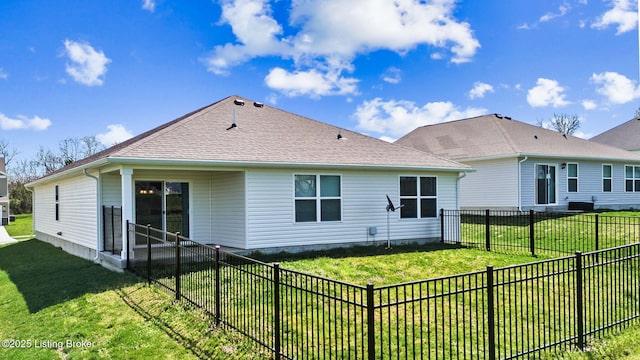 243 Zelcova Dr, Eminence, KY 40019 - back of property with roof with shingles, a fenced backyard, and a lawn