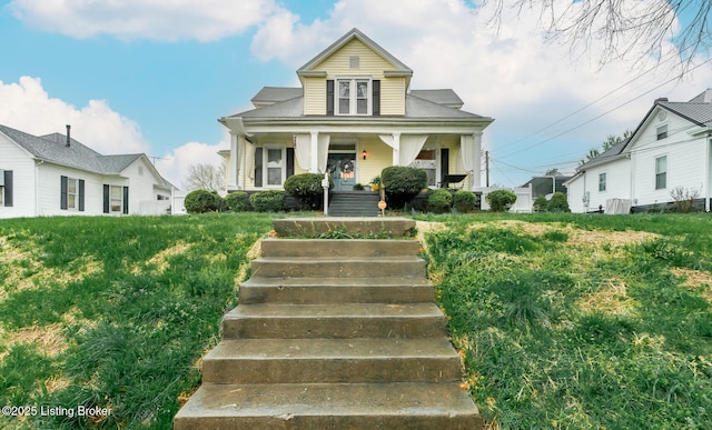 bungalow-style house with covered porch and stairs