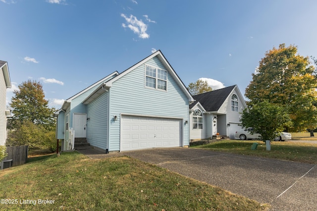 view of front of property featuring driveway, entry steps, a front yard, and a garage
