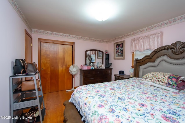 3019 Leman Dr, Louisville, KY 40220 - bedroom featuring wood finished floors and a closet