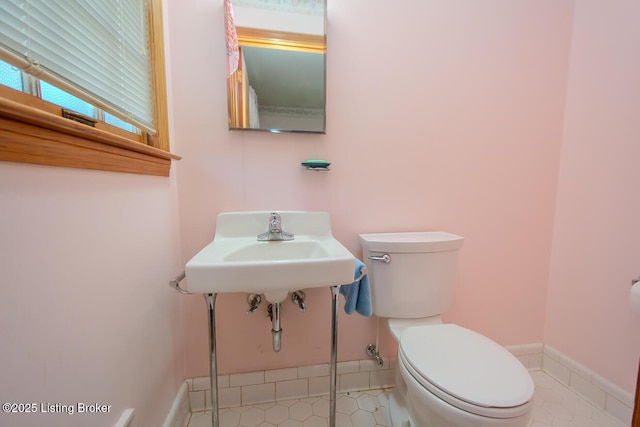 3019 Leman Dr, Louisville, KY 40220 - bathroom featuring tile patterned floors, baseboards, and toilet