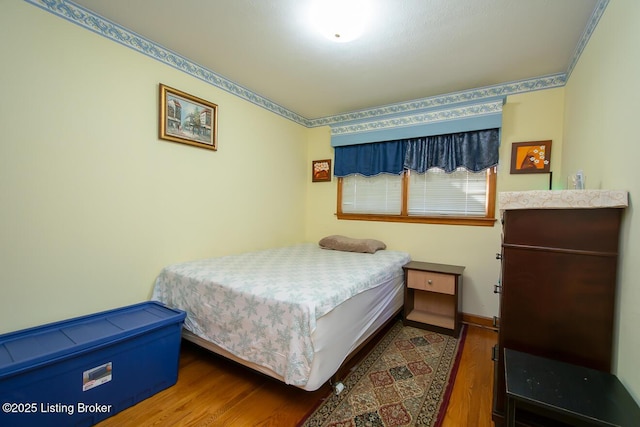 3019 Leman Dr, Louisville, KY 40220 - bedroom featuring baseboards and wood finished floors