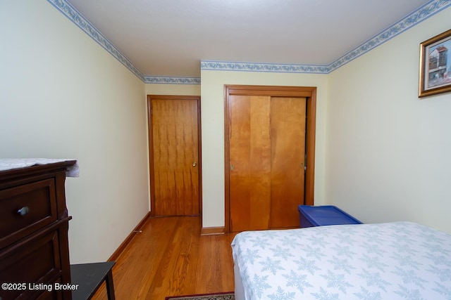 3019 Leman Dr, Louisville, KY 40220 - bedroom featuring light wood-style flooring and baseboards
