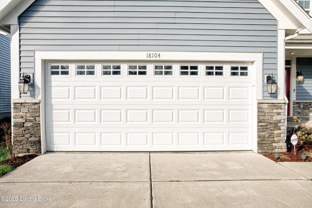18104 Bridle Run Dr, Louisville, KY 40245 - garage featuring concrete driveway