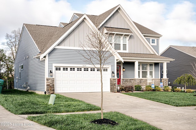 18104 Bridle Run Dr, Louisville, KY 40245 - craftsman-style house with stone siding, a garage, board and batten siding, a front lawn, and driveway