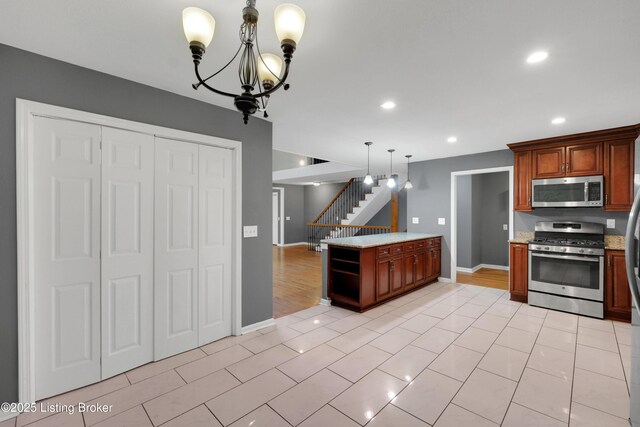 1468 Lakeshore Pkwy, Brandenburg, KY 40108 - kitchen with appliances with stainless steel finishes, recessed lighting, a chandelier, hanging light fixtures, and light tile patterned floors