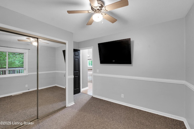 1468 Lakeshore Pkwy, Brandenburg, KY 40108 - unfurnished bedroom featuring carpet flooring, a closet, and ceiling fan
